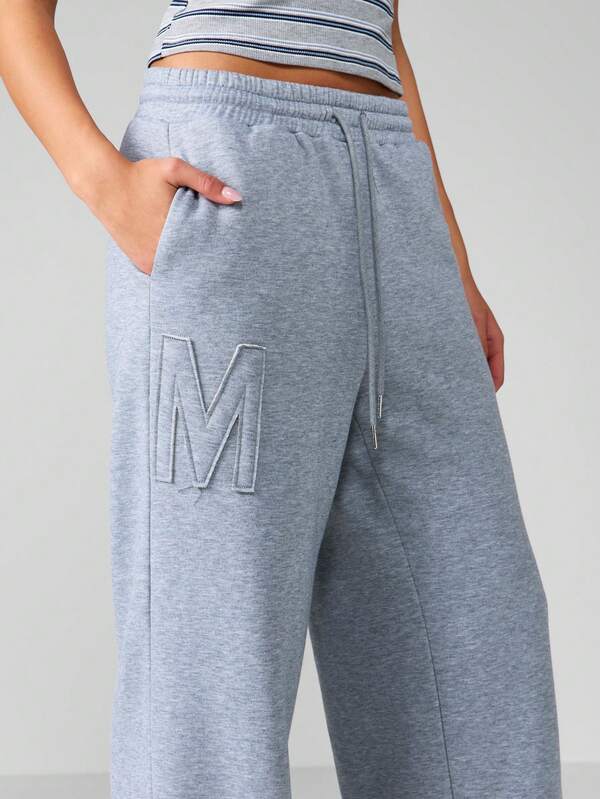 MISSGUIDED High Rise Wide Leg Joggers With Embossed Logo