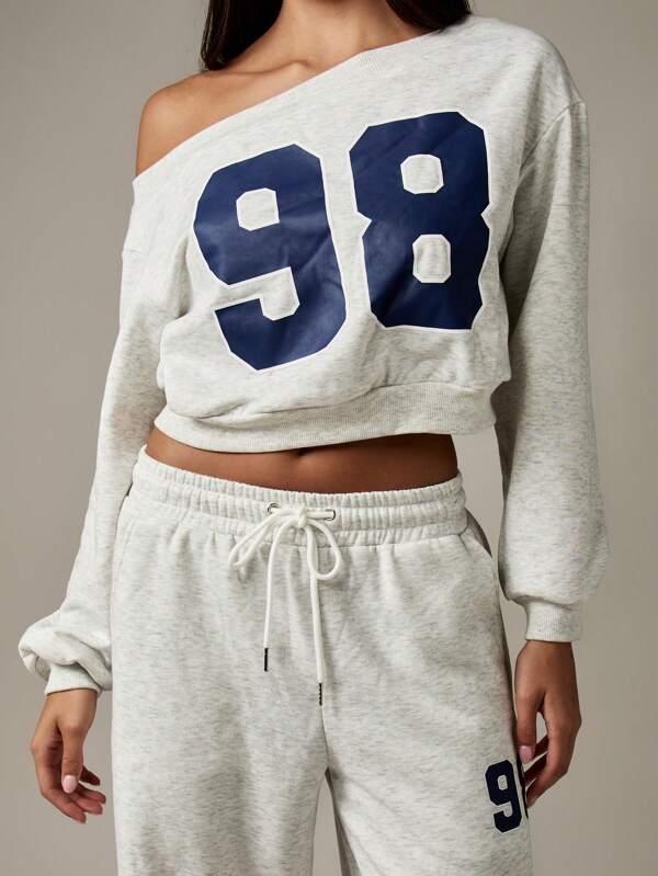 MISSGUIDED Off Shoulder Cropped Varsity Sweatshirt With Numeric Print
