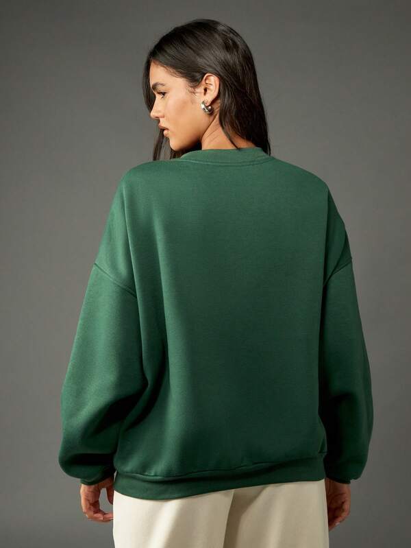 Missguided X Playboy Classic Crew Neck Sweatshirt With City Statement Design