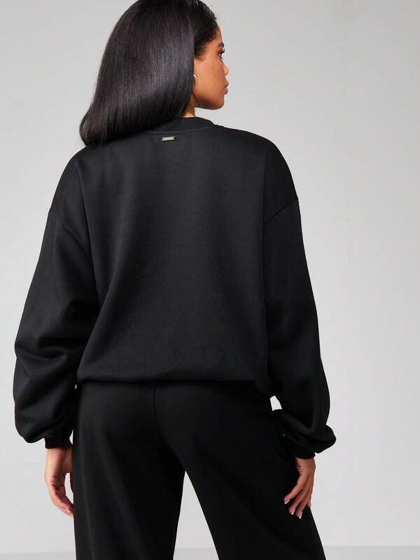 Missguided X Playboy Embossed Logo Crewneck Sweatshirt With Ribbed Trim