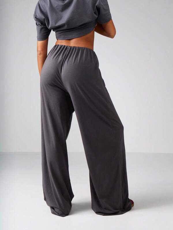 Missguided X Playboy Embossed Logo Crop Top And Wide Leg Pants Set