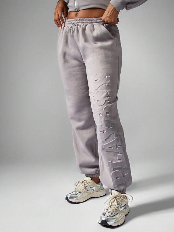 Missguided x Playboy Embossed Logo Jogger Sweatpants With Elastic Ankles