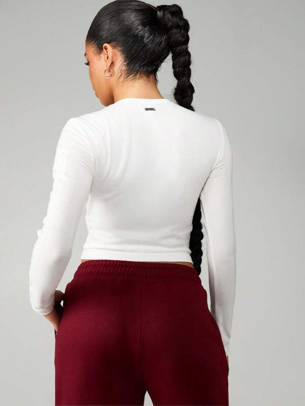 Missguided X Playboy Long Sleeve Embossed Crew Neck Top