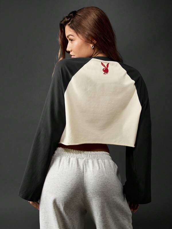Missguided X Playboy MISSGUIDED Long Sleeve Raglan Crop Top With Number Design