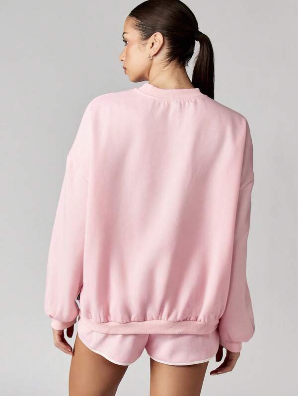 Missguided X Playboy MISSGUIDED Soft Oversized Crew Neck Sweatshirt Featuring Retro Graphics