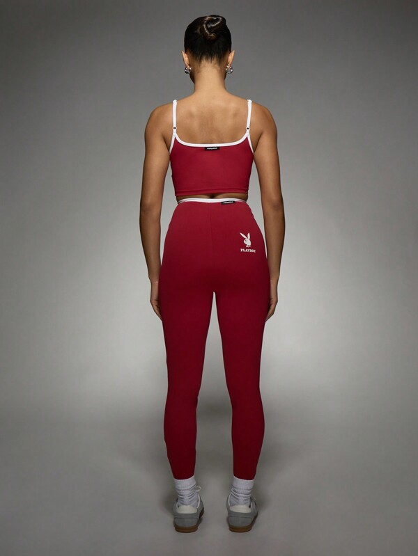 Missguided X Playboy MISSGUIDED Two-Piece Outfit With Sports Bra And High-Rise Leggings With Logo