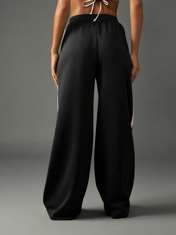 Missguided X Playboy MISSGUIDED Wide Leg Jogger Sweatpants With Stripe Detail