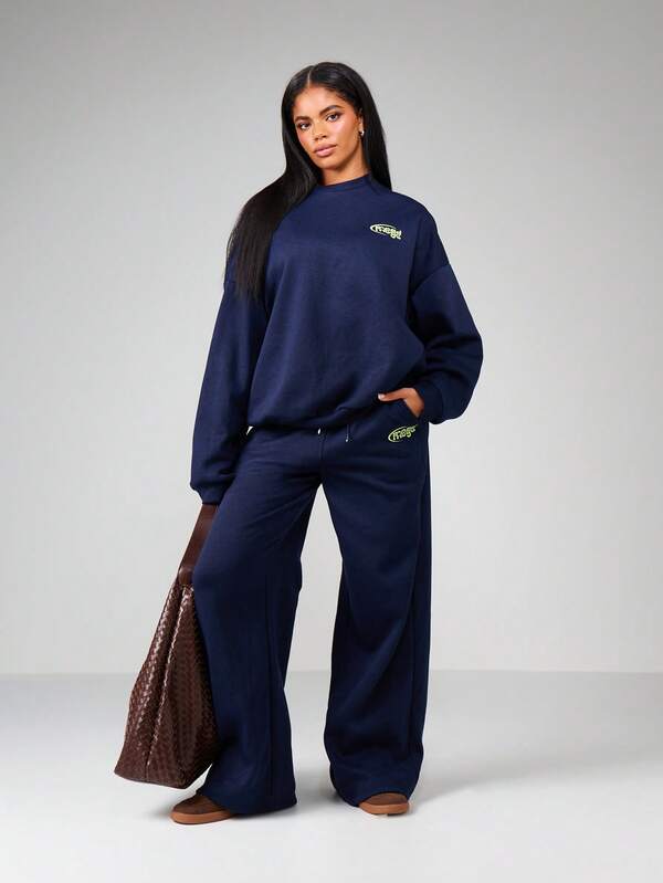 Missguided X Playboy Oversized Crew Neck Sweatshirt With Back Logo Print