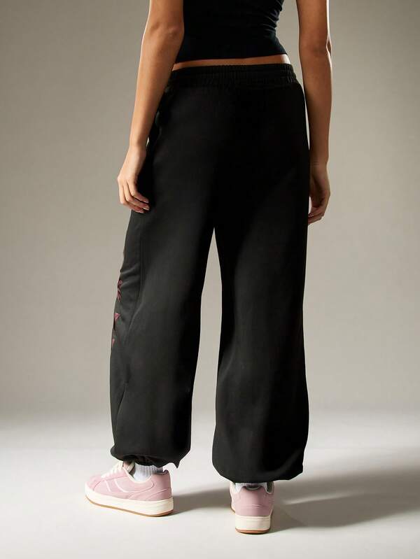 Missguided X Playboy Oversized Graphic Joggers With Camo Print