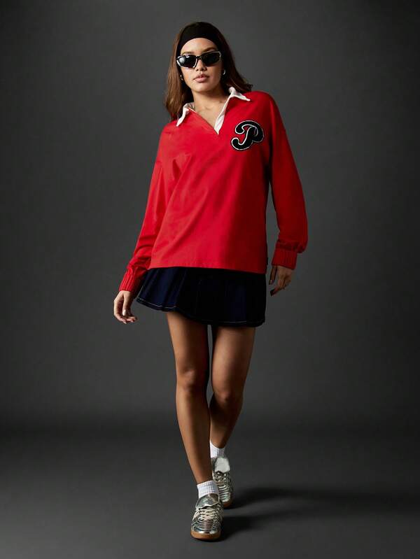 Missguided X Playboy Oversized Rugby Top With Collared Neckline And Bunny Print
