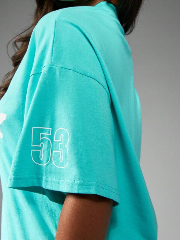 Missguided X Playboy Oversized Turquoise Tee With Racing Club Print
