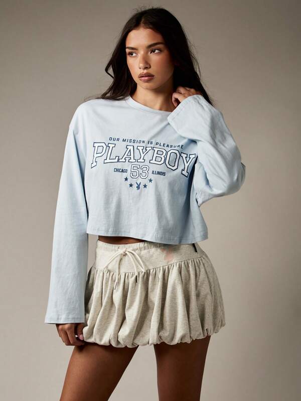 Missguided x Playboy Retro Graphic Crop Top With Long Sleeves And College Text