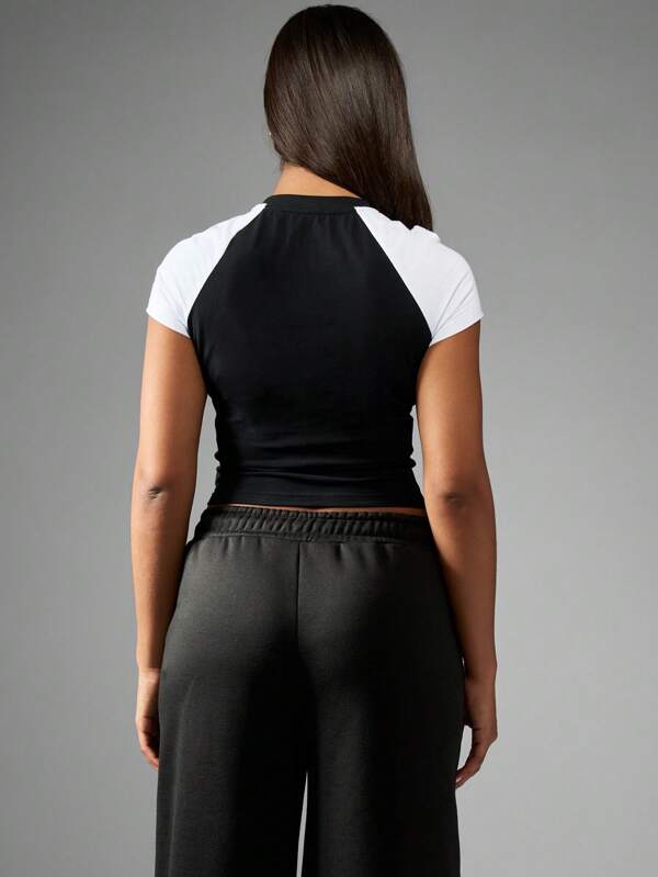 Missguided X Playboy Short Sleeve Fitted Raglan Crop Top With Bunny Logo