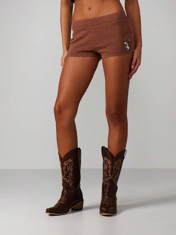 Missguided X Playboy Washed Brown Booty Shorts With Print