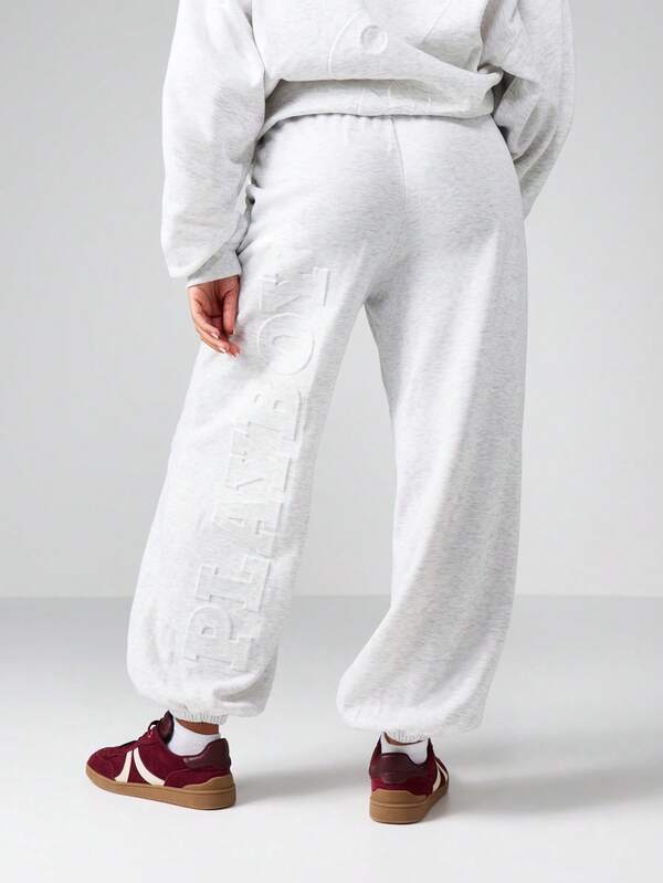 Missguided X Playboy Wide Leg Cuffed Joggers With Embossed Logo Pattern