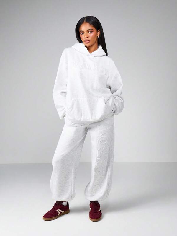 Missguided X Playboy Wide Leg Cuffed Joggers With Embossed Logo Pattern