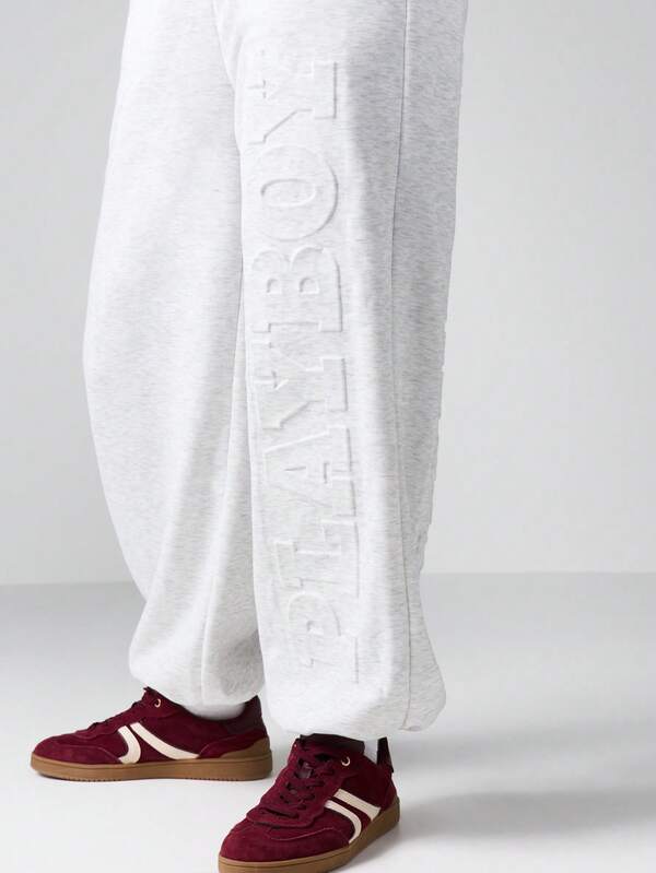 Missguided X Playboy Wide Leg Cuffed Joggers With Embossed Logo Pattern