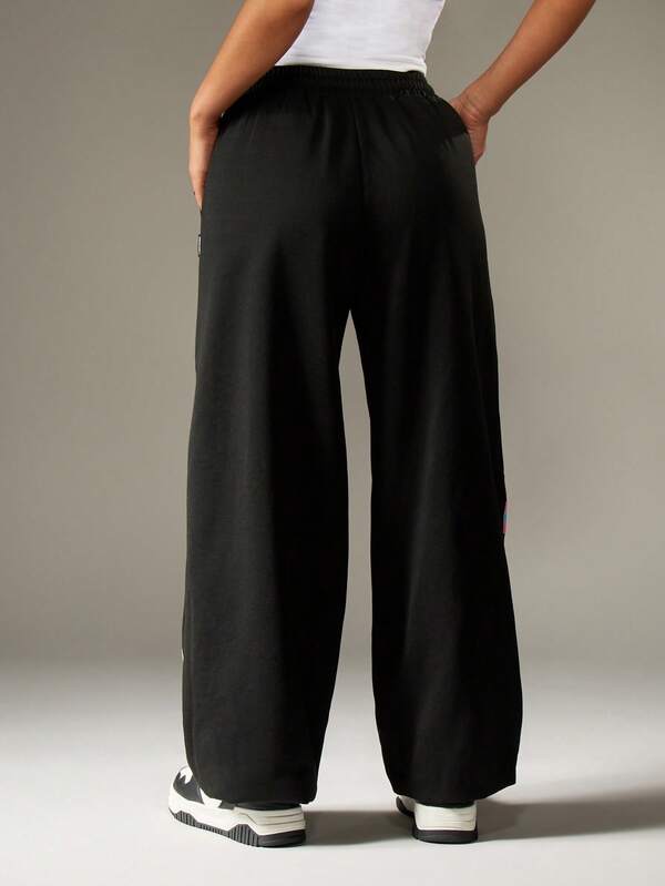 Missguided X Playboy Wide Leg Joggers With Colorful Graphics