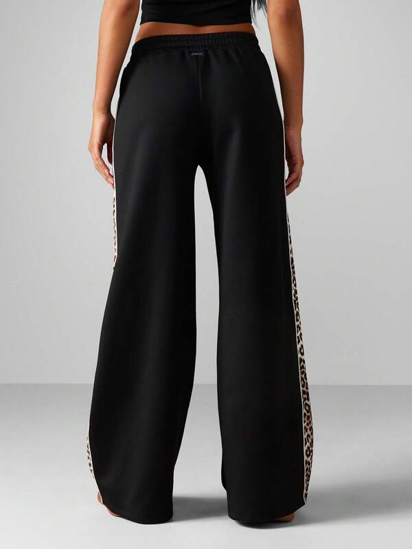 Missguided X Playboy Wide Leg Joggers With Leopard Print Stripe