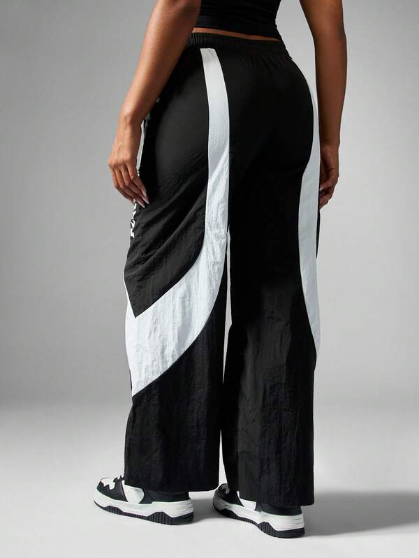 Missguided X Playboy Wide Leg Track Pants With Contrast Panel Design